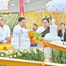 SAC Chairman Prime Minister Senior General Min Aung Hlaing and his wife Daw Kyu Kyu Hla, council members and their wives pour water on banyan trees